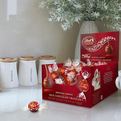 Lindt LINDOR Milk Chocolate Candy Truffles. Milk Chocolate with Smooth. Melting Truffle Center. 25.4 oz.. 60 Count